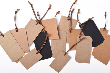 Various shape of blank craft paper label or cloth tag set isolated on white background. Shopping,...