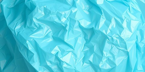 Obraz premium A crumpled, translucent light blue garbage bag, partially filled, debris, household