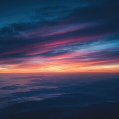 Fototapeta premium Sunrise over a misty mountain range