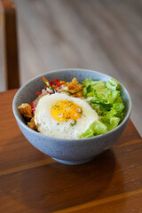 Rice Bowl Egg Sambal Matah, captured on August 29, 2025. Steaming rice with sunny side up egg and fresh sambal matah, vibrant Indonesian comfort food in a modern lifestyle setting