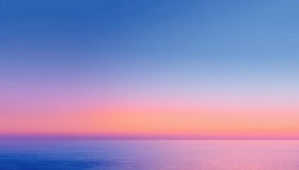 Fototapeta premium Soft, pastel sunset over a calm sea