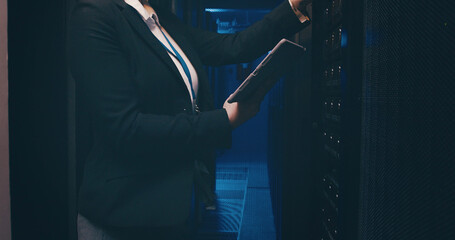 Technician, hands and woman with tablet in server room to install software, system backup or...
