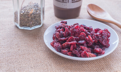 dried cranberries on a plate on the table
