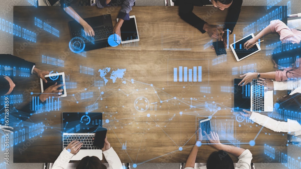 Poster a group of diverse professionals engaged in a business meeting, using laptops and digital tools whil