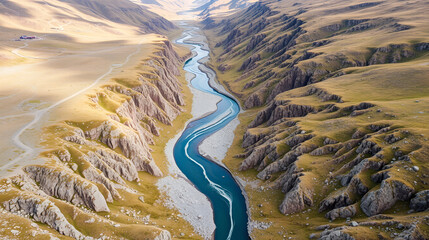 The valley of a mountain river with gravelly-rocky rifts (cripples, river meandering, meander pattern). View from the height of the birds eye view. the Chukchi Peninsula