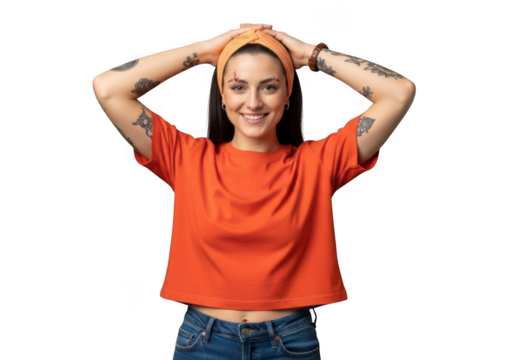 Young woman with tattoos wearing an orange tshirt and hairband, smiling and holding her hands on her head, isolated on transparent background - Powered by Adobe