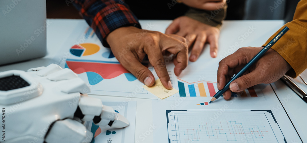 Poster a close-up view of hands engaging in a business meeting, analyzing data charts and graphs, highlight