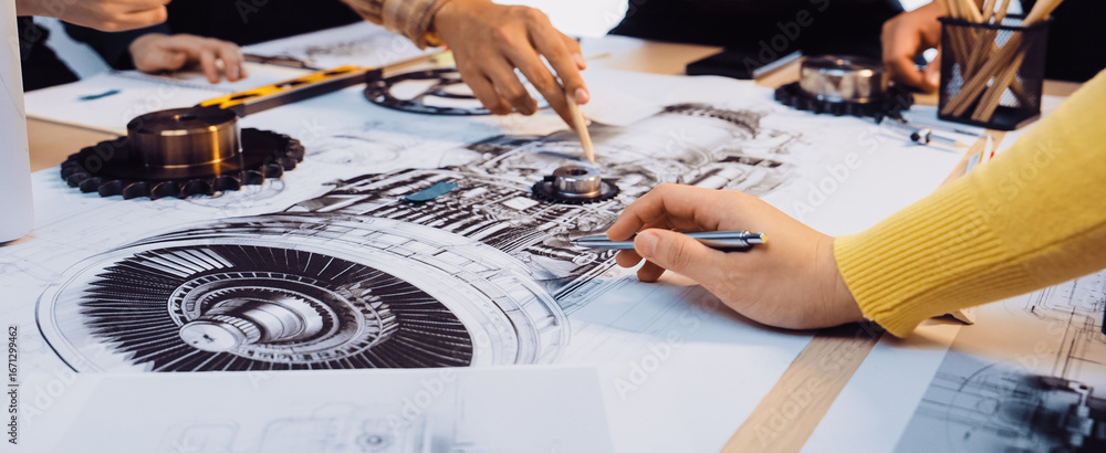 Poster a group of engineers engaged in a creative workshop, actively analyzing detailed technical drawings 