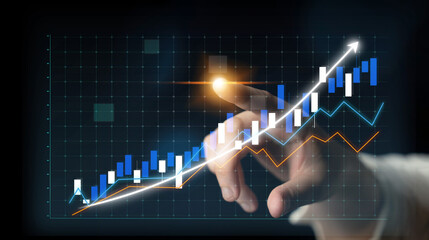 A hand interacts with a glowing financial chart, emphasizing trends in growth and investment in a modern digital landscape, reflecting market dynamics. Impute