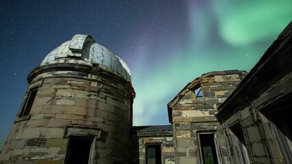 Green Aurora Borealis over Stone Observatory Ruins at Night - Powered by Adobe