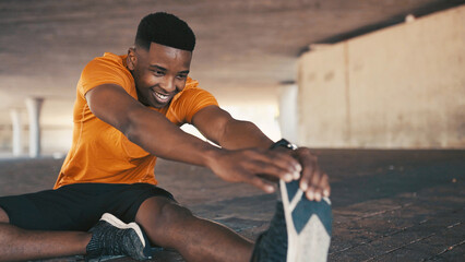 Happy, athlete and black man stretching for fitness, exercise and preparation for training. Male person, warm up and runner getting ready for sports workout, muscle flexibility and marathon practice