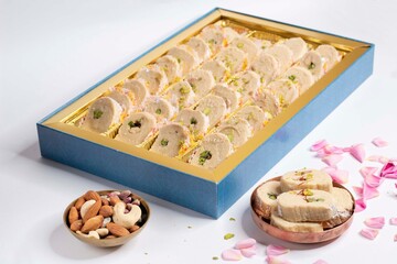 Indian sweet dessert on decorated traditional background 
