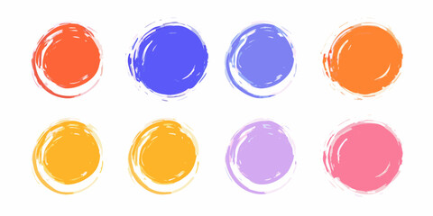 Collection of eight colorful abstract brush stroke circles on a white background