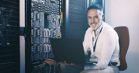 Laptop, portrait and technician or man in server room for data center, network or systems....