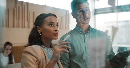 Business, people and brainstorming by glass with tablet for research, sticky note and team discussion. Info, schedule or agenda with employees planning, collaboration and tech for project management