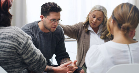 Fototapeta premium Support group, empathy and sad man in therapy for mental health, hope or healing depression. Psychology, comfort people and counseling with kindness, help and care with trauma in community center