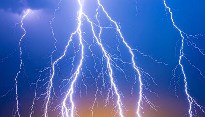 Multiple lightning bolts illuminate a twilight sky