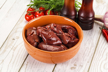 Raw chicken liver uncooked in the bowl