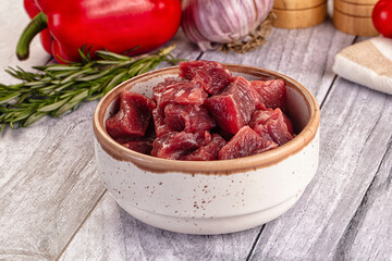 Raw beef meat cubes pieces