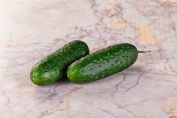 Ripe green raw two cucumbers