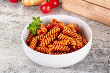 Italian fusilli pasta with tomatoes