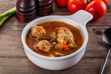 Tomato Soup with meatballs and vegetables