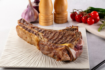 Grilled ribeye beef steak with bone