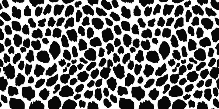 Seamless black and white dalmatian spots pattern for animal print backgrounds