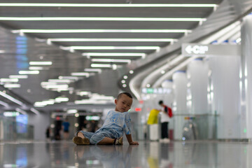 a little boy in subway
