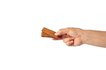 Chocolate bar in hand on transparent background