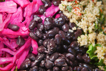 Vibrant quinoa salad with beans and pickles