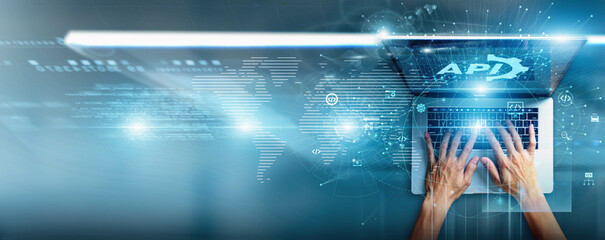 Software engineer using a laptop with API data integration workflows, endpoint management, real-time communication, automation processes, secure protocols, and scalable connectivity.