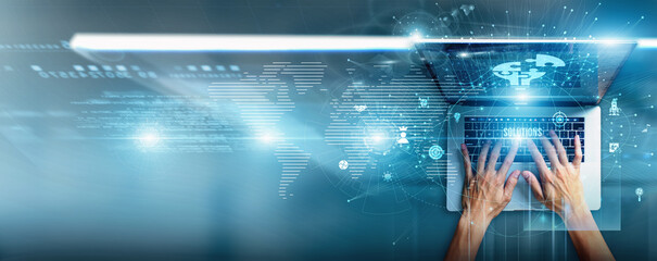 Consultant using laptop with business solutions data strategy design, workflow optimization, client challenges, innovation pathways, productivity tools, and sustainable growth models.