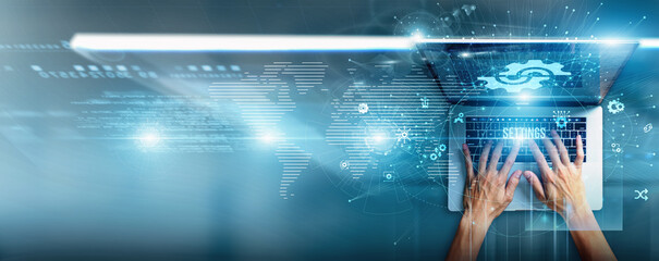 Administrator using a laptop with system settings data configuration files, security preferences, access controls, optimization tools, software updates, and environment management.