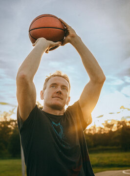 Portrait of a man with a basketball in his hands