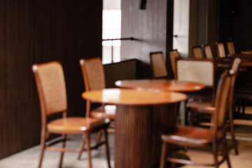 Modern Cafe Interior with Wooden Chairs and Tables