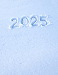 Year 2025 written in snow