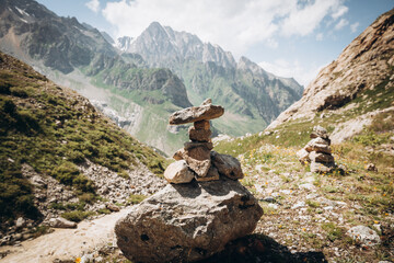 Stack of stones on top of the mountain, Dolomites, Italy. Concept of balance and harmony.