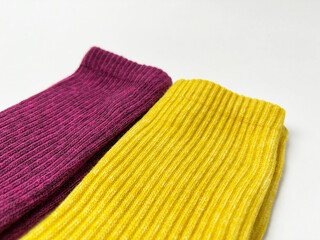 Close-up of maroon and yellow socks