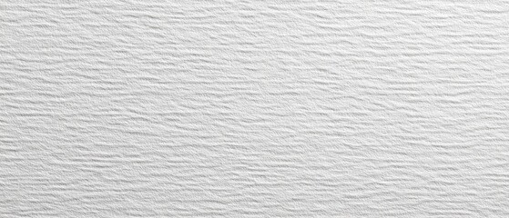 Close-up view of a textured, white surface with subtle ridges