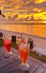 Tropical Drinks on Beach at Sunset