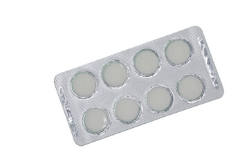 An Aluminum Blister Pack With White Round Pills Or Tablets, Isolated On A White Background....