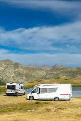 Camper Vans Enjoying Stunning Mountain View in Piedmont, Italy