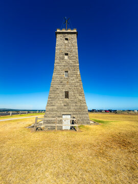 The Williamstown Timeball Tower at Point Gellibrand against a dark blue sky, Victoria, Australia