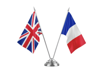 British and French flags displayed on a silver stand, symbolizing unity and cooperation, isolated on white background