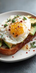 Sunny Side Up Egg on Toast with Avocado Topping