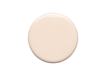 A smooth, pale beige circle stands out against a stark black background.