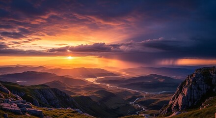 Scenic Mountain Range at Colorful Sunset with Dramatic Clouds and Winding River