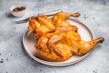 Roasted Spatchcock Chicken, poultry meat. grey background. top view