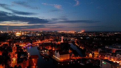 Fototapeta premium modern european city street houses view from above night evening illumination Gdansk Poland